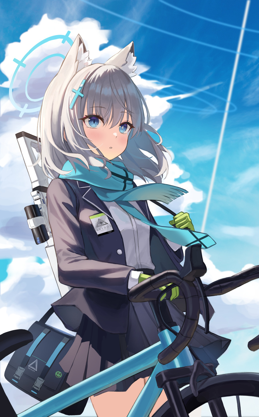 1girl absurdres animal_ear_fluff animal_ears assault_rifle bag bangs bicycle blue_archive blue_eyes blue_jacket blue_scarf blush breast_pocket cross_hair_ornament extra_ears gloves green_gloves grey_hair ground_vehicle gun hair_ornament halo highres holding id_card jacket looking_at_viewer medium_hair mismatched_pupils open_clothes open_jacket outdoors plaid plaid_skirt pleated_skirt pocket rahy rifle scarf school_bag school_uniform shiroko_(blue_archive) shirt skirt striped striped_scarf weapon white_shirt wolf_ears