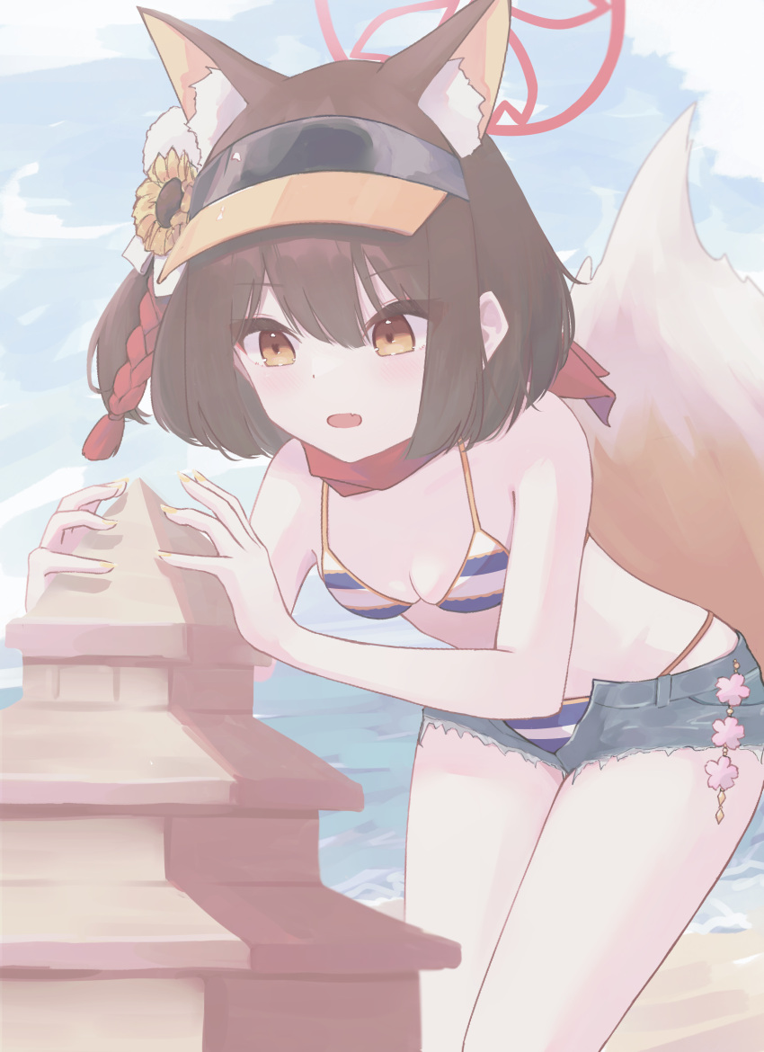 1girl absurdres animal_ear_fluff animal_ears bare_shoulders beach bikini blue_archive blue_sky blush breasts brown_hair cleavage cloud eyeshadow fang flower fox_ears fox_tail fujina_(fujina31q) hair_between_eyes hair_flower hair_ornament halo highres izuna_(blue_archive) izuna_(swimsuit)_(blue_archive) makeup medium_hair nail_polish open_fly open_mouth red_eyeshadow sand sand_castle sand_sculpture scarf short_shorts shorts sidelocks sky small_breasts striped_bikini striped_clothes sunflower swimsuit tail tassel visor_cap water yellow_eyes