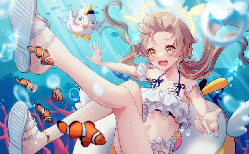 1girl anklet bikini blue_archive blush brown_hair clownfish coral fish floating_hair frilled_bikini frills hifumi_(blue_archive) hifumi_(swimsuit)_(blue_archive) highres innertube jewelry lazy_cat long_hair low_twintails navel open_mouth outstretched_arms sandals smile solo swim_ring swimsuit twintails underwater very_long_hair yellow_eyes