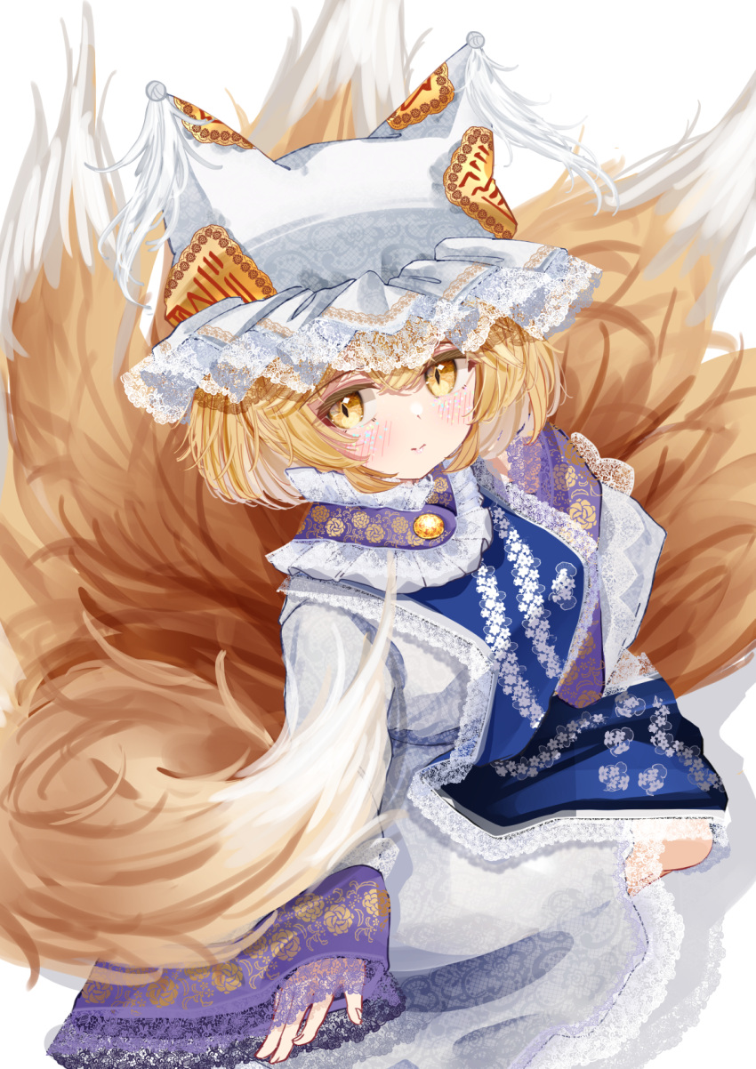 1girl animal_hat blonde_hair blue_tabard blush closed_mouth commentary_request dress fox_tail hat highres kitsune kyuubi long_sleeves looking_at_viewer mob_cap multiple_tails sarasadou_dan short_hair sleeves_past_wrists smile solo tabard tail touhou white_dress yakumo_ran yellow_eyes