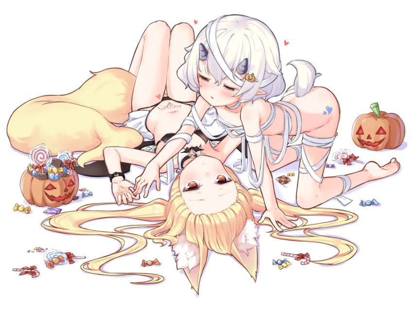 2girls animal_ears bandages bikini black_bikini blonde_hair blush brown_eyes detached_collar flat_chest food fox_ears fox_girl fox_tail hair_ornament halloween halloween_bucket heart horns jack-o'-lantern jack-o'-lantern_hair_ornament lying multiple_girls naked_bandage on_back oni_horns original parted_lips shokupan_(slvk12) short_hair stomach_tattoo sweets swimsuit tail tattoo twintails white_background white_hair wrist_belt yellow_eyes yuri