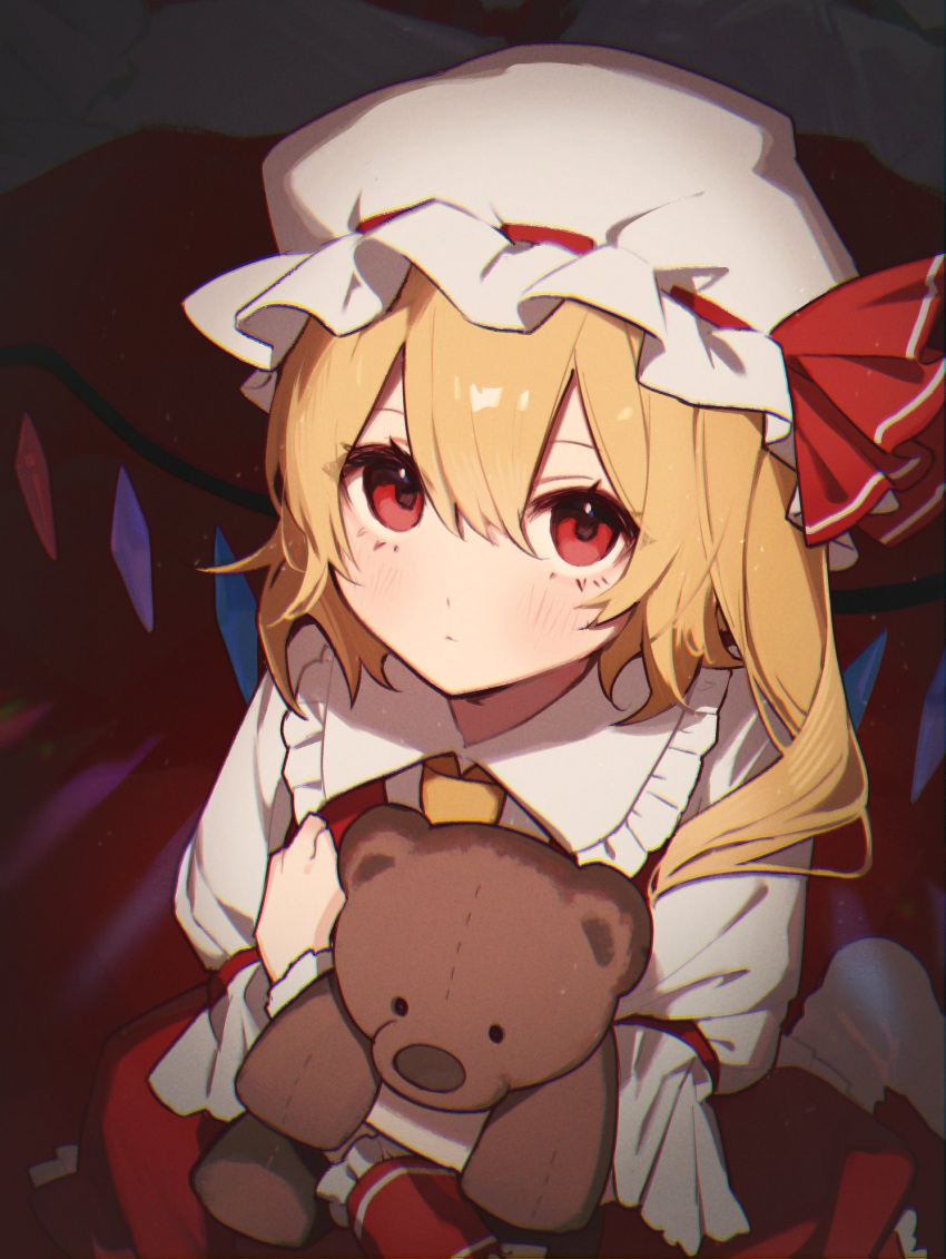 1girl ascot bangs blonde_hair blush closed_mouth commentary dress flandre_scarlet hair_between_eyes hat hat_ribbon highres holding holding_stuffed_toy long_hair looking_at_viewer mob_cap motamo_(motamotri) red_dress red_eyes red_ribbon ribbon shirt short_sleeves socks solo stuffed_animal stuffed_toy teddy_bear touhou white_headwear white_shirt white_socks wings yellow_ascot