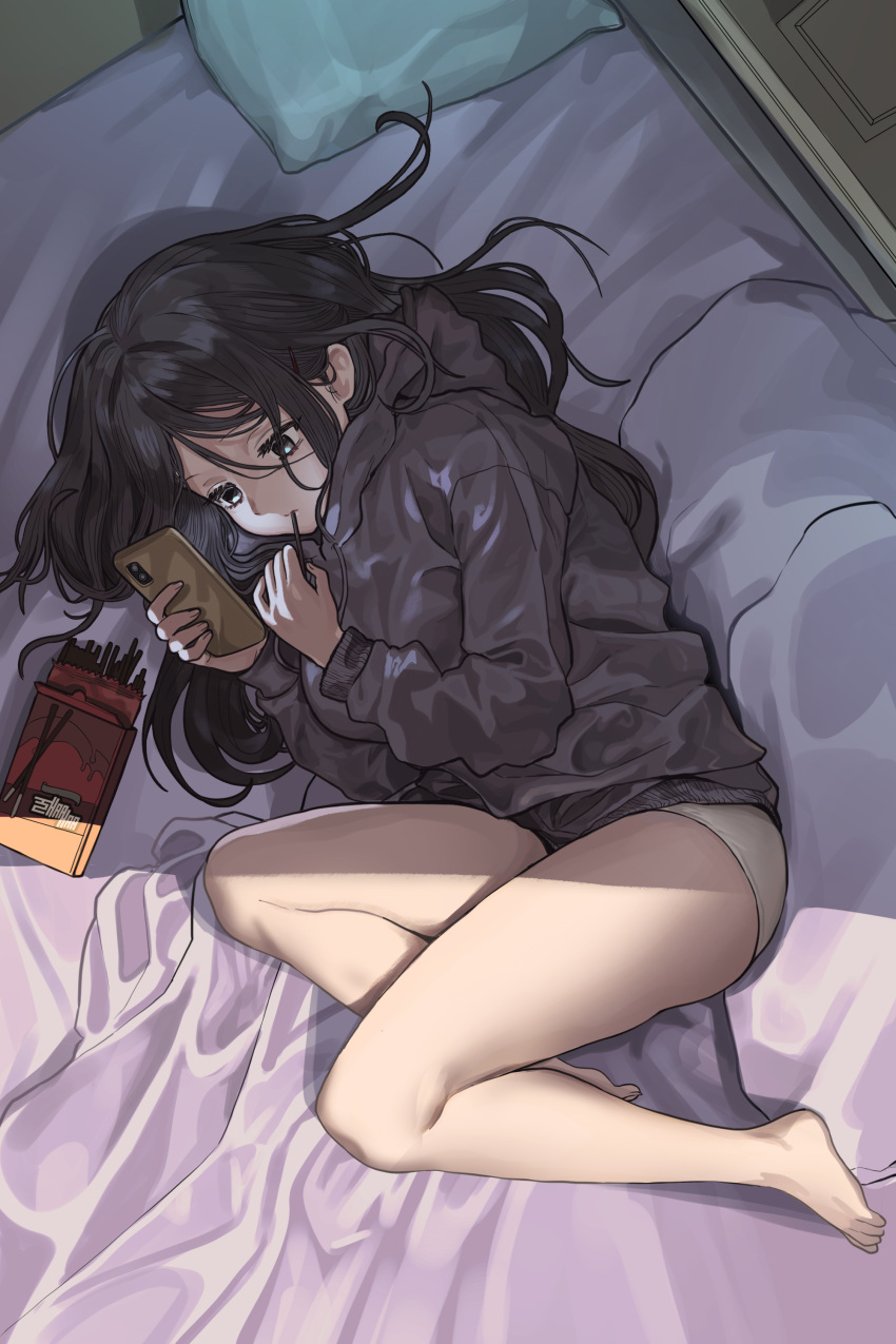 1girl absurdres black_hair blue_eyes cellphone chocolate chroong eating food food_in_mouth highres holding holding_food holding_phone indoors long_hair lying on_bed on_side original panties phone pillow pocky smartphone solo sweater underwear