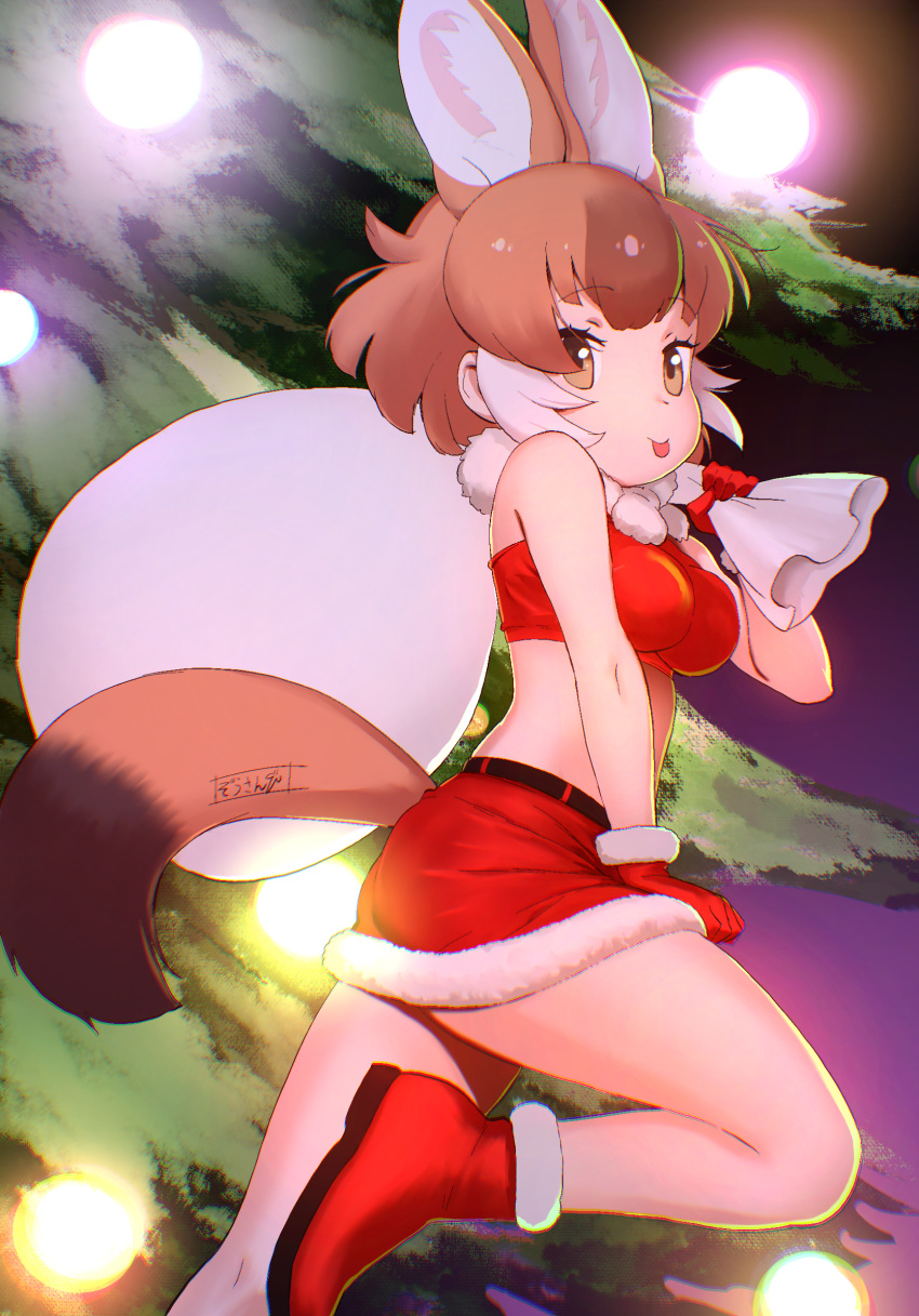 1girl :p animal_ears bare_shoulders belt boots brown_hair christmas christmas_tree commentary crop_top dhole_(kemono_friends) dog_ears dog_girl dog_tail extra_ears from_side fur-trimmed_boots fur-trimmed_gloves fur-trimmed_skirt fur_collar fur_trim gloves highres kemono_friends long_hair looking_at_viewer looking_to_the_side masuyama_ryou midriff multicolored_hair red_footwear red_gloves red_skirt sack santa_costume skirt smile solo tail tail_through_clothes tongue tongue_out two-tone_hair white_hair