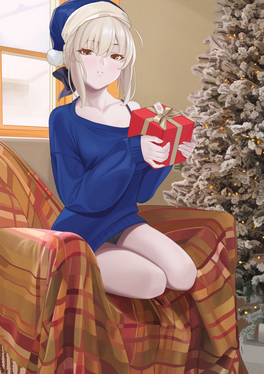 1girl absurdres alternate_costume armchair artoria_pendragon_(fate) black_bra black_panties black_ribbon blonde_hair blue_headwear blue_sweater box bra brown_eyes chair christmas christmas_ornaments christmas_tree collarbone fate/grand_order fate_(series) fur-trimmed_headwear gift gift_box hair_bun hair_ribbon hat highres holding holding_box holding_gift indoors long_sleeves on_chair panties quatthro ribbon santa_alter santa_hat sitting solo sweater underwear window