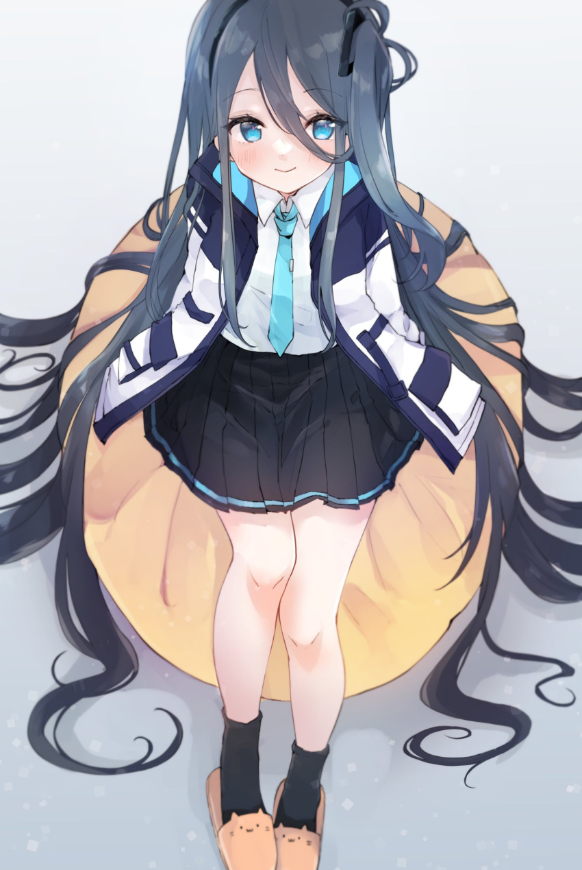 1girl absurdres aris_(blue_archive) bangs black_hair black_skirt black_socks blue_archive blue_eyes blue_jacket blue_necktie blush cat_slippers commentary dot_nose grey_background hair_between_eyes halo highres jacket kayuma legs long_hair long_sleeves looking_at_viewer multicolored_clothes multicolored_jacket necktie orange_footwear pleated_skirt shirt sidelocks sitting skirt smile socks solo two-tone_jacket very_long_hair white_jacket white_shirt