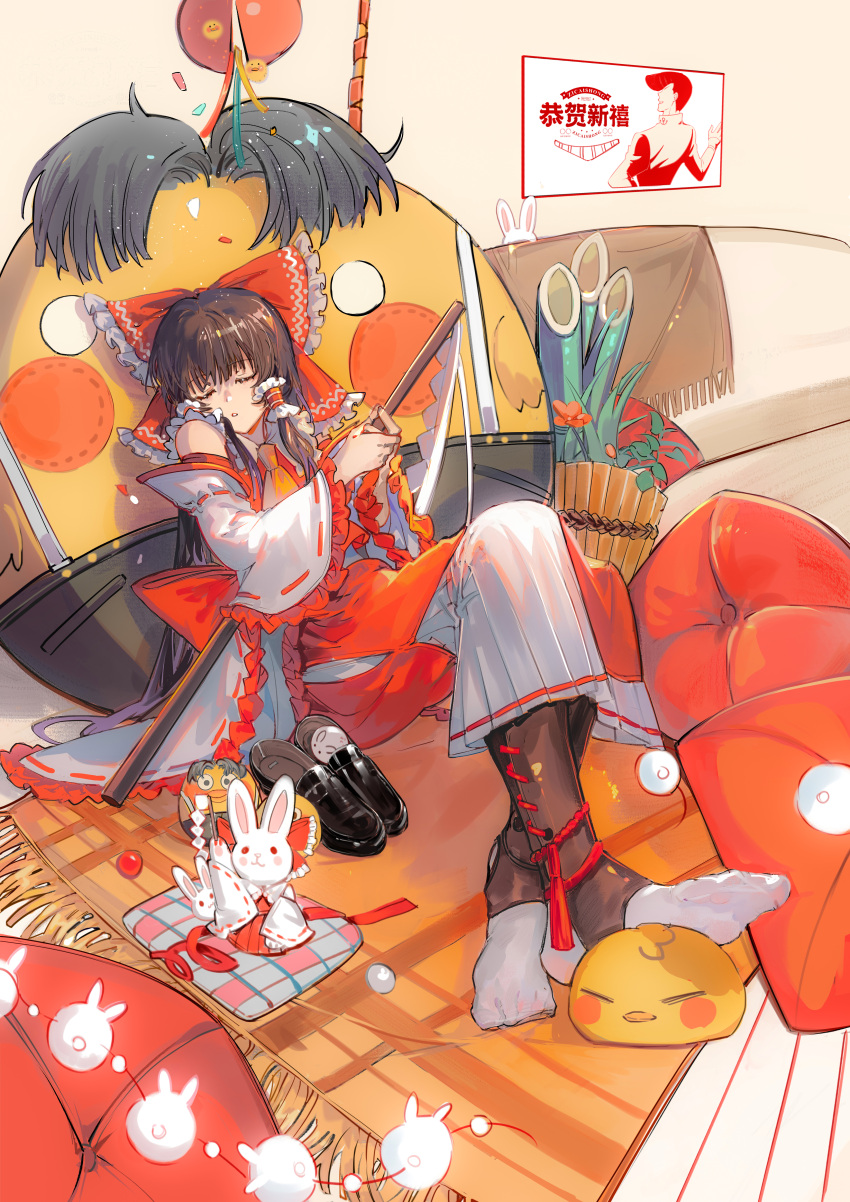 1girl absurdres ascot bamboo black_footwear bow brown_hair chinese_commentary closed_eyes commentary confetti cushion detached_sleeves facing_viewer flower frilled_bow frilled_hair_tubes frilled_sleeves frills full_body gohei hair_bow hair_tubes hakama hakurei_reimu highres holding holding_gohei japanese_clothes long_hair mat parted_lips poster_(object) red_bow red_flower red_skirt red_vest ribbon-trimmed_sleeves ribbon_trim shoes shoes_removed sidelocks skirt skirt_set sleeping socks solo stuffed_animal stuffed_toy touhou vest white_hakama white_sleeves white_socks wide_sleeves xiuchundao yellow_ascot