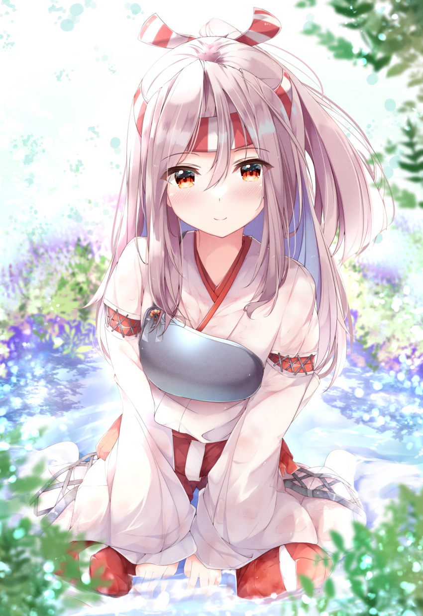 1girl absurdres bangs between_legs brown_eyes closed_mouth commentary_request detached_sleeves fuuna grey_hair hachimaki hair_between_eyes hand_between_legs headband high_ponytail highres japanese_clothes kantai_collection kimono long_hair looking_at_viewer muneate outdoors partially_submerged pleated_shorts red_shorts shorts sitting smile solo wariza white_kimono wide_sleeves zuihou_(kancolle)