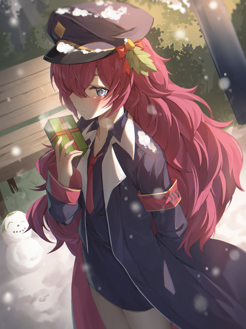 1girl absurdres armband bench blue_archive christmas_present collared_shirt gift gr_greeze grey_eyes hair_ribbon hat highres holding holding_gift iroha_(blue_archive) long_hair military military_hat military_jacket military_uniform necktie park_bench peaked_cap pencil_skirt red_hair red_necktie ribbon shirt skirt snow snowman uniform wavy_hair
