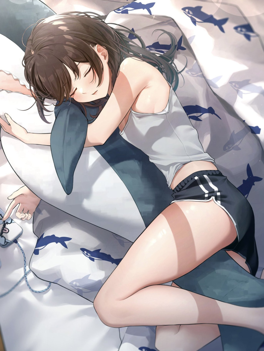 1girl animal_print bangs bare_arms bare_legs bare_shoulders bed between_legs black_shorts blanket breasts brown_hair camisole cellphone charging_device closed_eyes commentary dolphin_shorts double_vertical_stripe feet_out_of_frame fish_print from_above grey_camisole highres indoors legs long_hair lying midriff object_hug on_bed on_side original phone shark short_shorts shorts sideboob sidelocks sleeping small_breasts smartphone smartphone_case stuffed_animal stuffed_fish stuffed_toy symbol-only_commentary thighs vegetablenabe