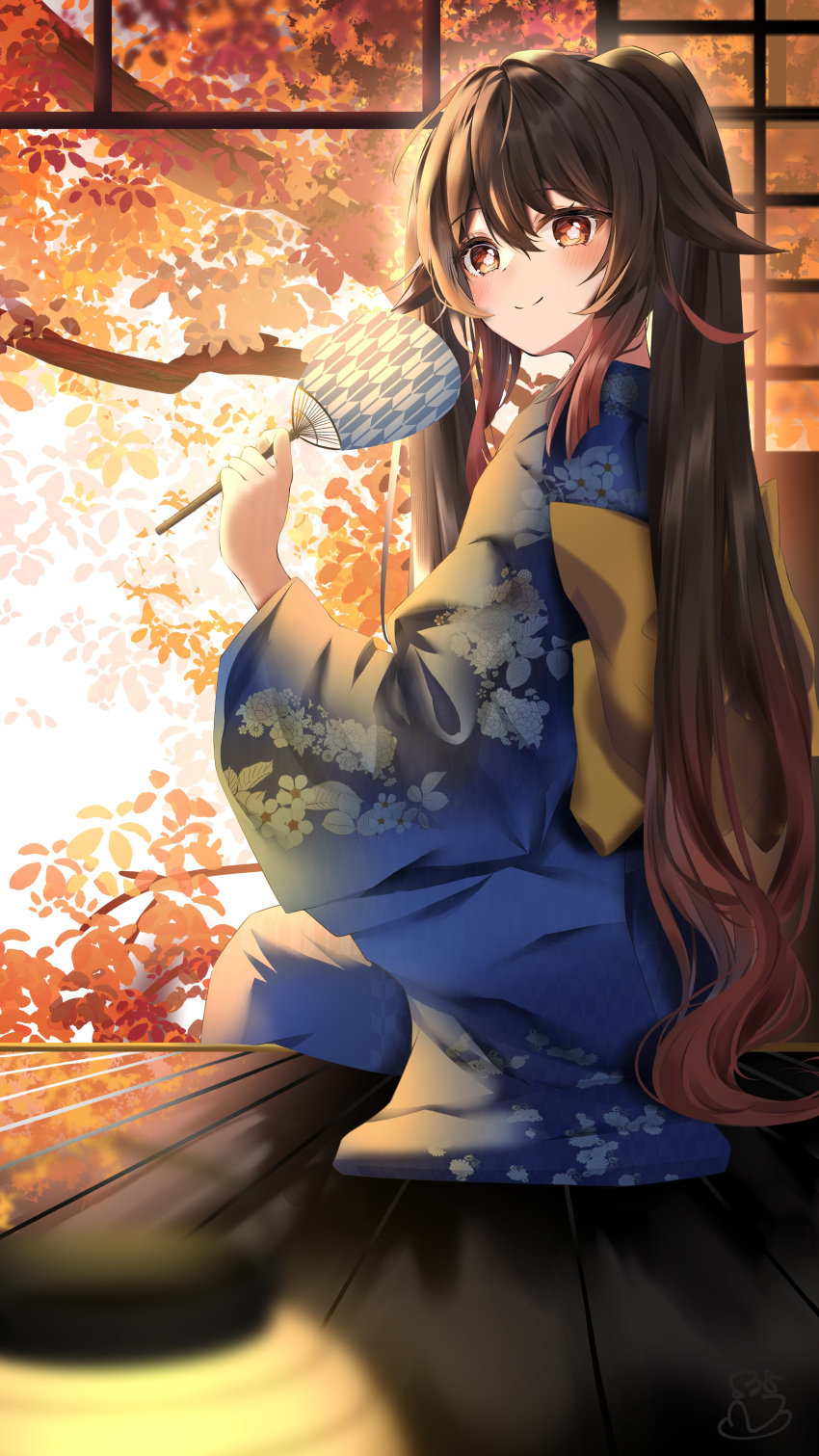 1girl absurdres back_bow bangs blue_kimono blush bow branch brown_eyes brown_hair closed_mouth commentary eyelashes floral_print flower-shaped_pupils genshin_impact gradient_hair hair_between_eyes hand_fan hand_up highres holding holding_fan hu_tao_(genshin_impact) japanese_clothes kimono komiya_latte long_hair long_sleeves looking_at_viewer looking_back multicolored_hair obi paper_fan porch print_kimono sash shouji sidelocks sitting sliding_doors smile solo split_mouth symbol-shaped_pupils tree twintails uchiwa very_long_hair wide_sleeves yellow_bow
