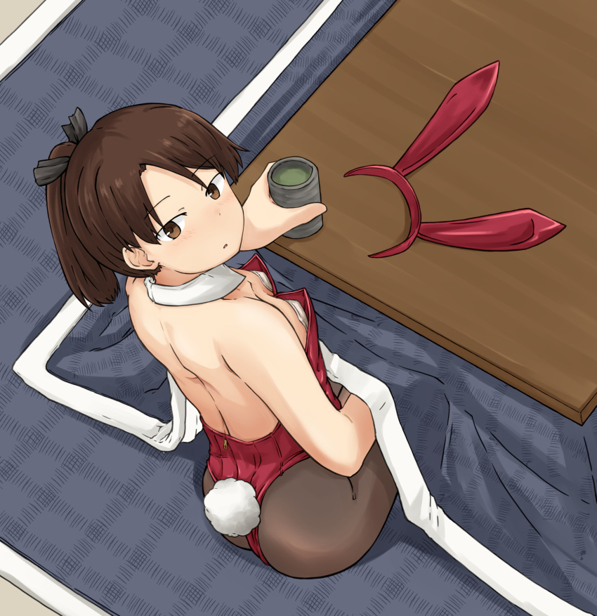 1girl alternate_costume animal_ears ass black_pantyhose breasts brown_eyes brown_hair chagamaka cup detached_collar downblouse fake_animal_ears from_behind headwear_removed highres kantai_collection kotatsu leotard looking_at_viewer looking_back pantyhose pasties playboy_bunny rabbit_ears rabbit_tail red_leotard shikinami_(kancolle) short_hair short_ponytail sitting small_breasts solo strapless strapless_leotard table tail wrist_cuffs yunomi