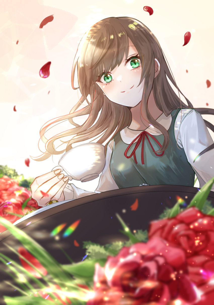 1girl absurdres bangs blurry blurry_foreground blush brown_hair collared_shirt cup falling_petals flower from_below green_eyes highres holding holding_cup long_hair long_sleeves neck_ribbon original petals ribbon rose school_uniform shirt smile solo ssn_(sasa8u9r) table teacup wind