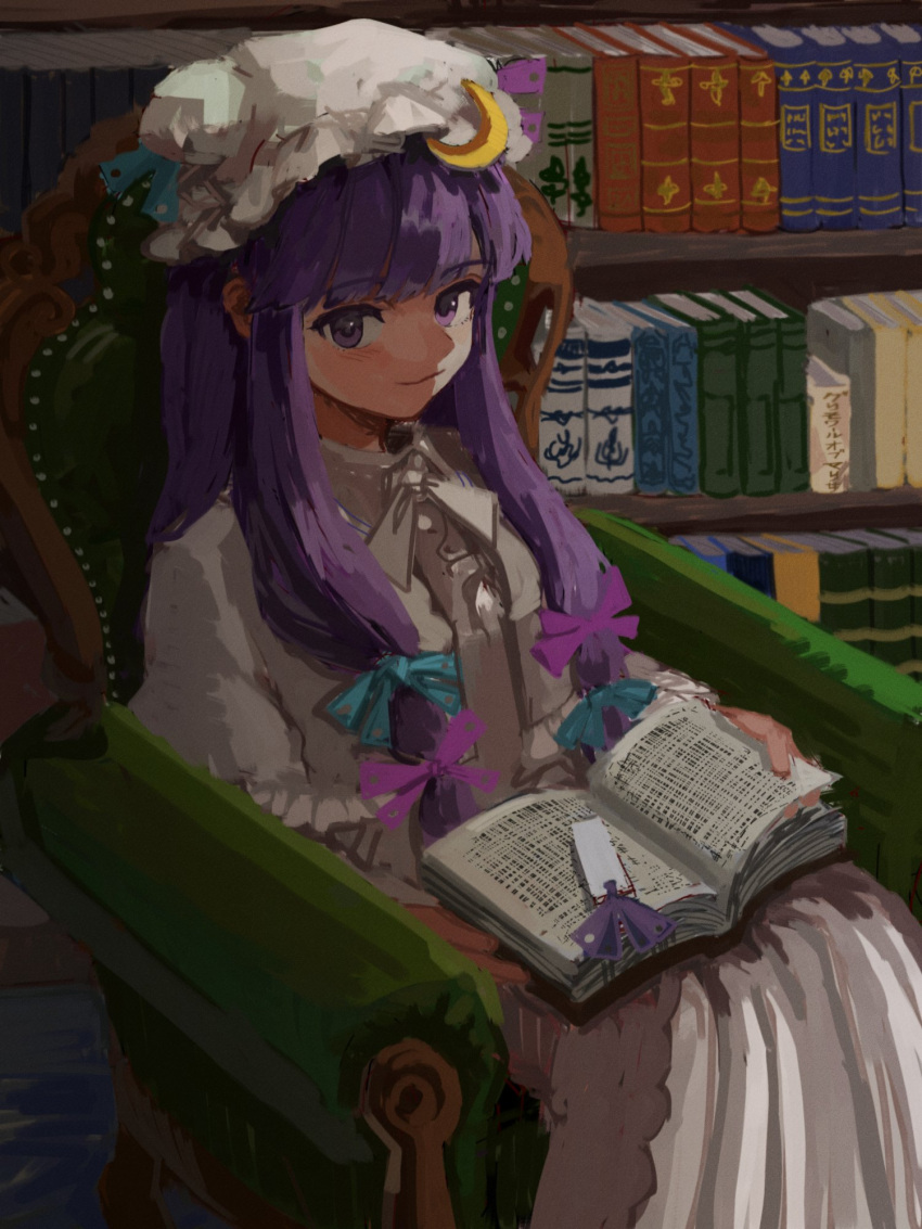 1girl armchair b_nosk101 book bookmark bookshelf chair closed_mouth crescent crescent_hat_ornament dress feet_out_of_frame hat hat_ornament highres indoors long_hair long_sleeves looking_at_viewer mob_cap open_book patchouli_knowledge purple_eyes purple_hair sitting smile solo touhou white_dress white_headwear