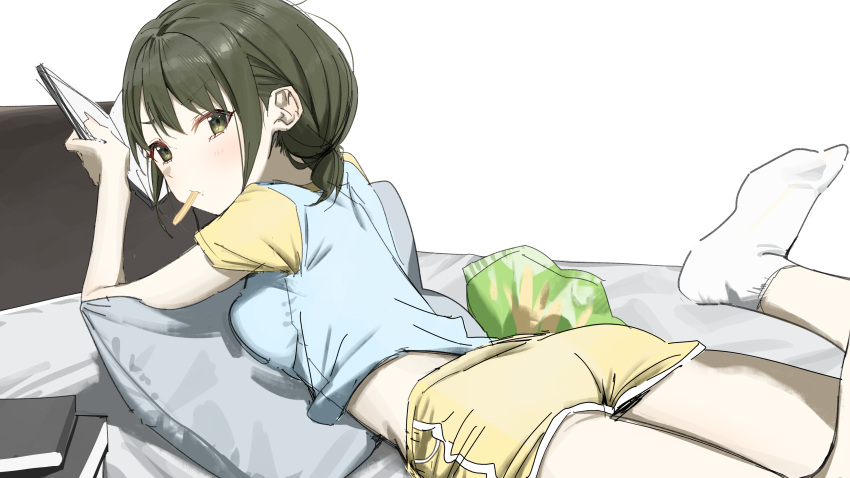 1girl absurdres ass blue_shirt book book_stack chips_(food) cropped_legs dolphin_shorts food food_in_mouth green_eyes green_hair highres holding holding_book idolmaster idolmaster_shiny_colors leg_up looking_at_viewer looking_back low_twintails midriff_peek nanakusa_nichika on_bed potato_chips shirt short_hair short_sleeves short_twintails shorts socks solo syhan twintails white_socks yellow_shorts