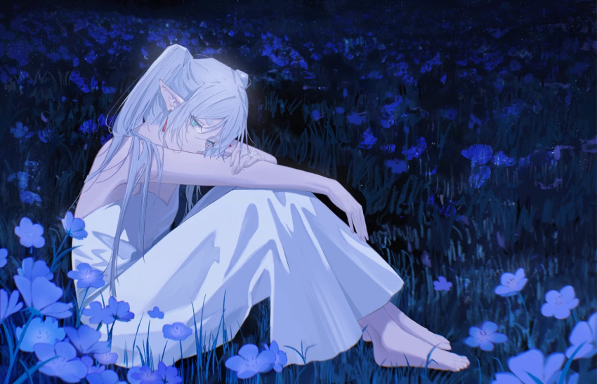 1girl barefoot commentary_request dress earrings elf field flower flower_field frieren hand_on_own_arm highres jewelry long_hair nemophila_(flower) night outdoors pointy_ears qiu_(user_yhvx8584) sitting solo sousou_no_frieren white_dress white_hair