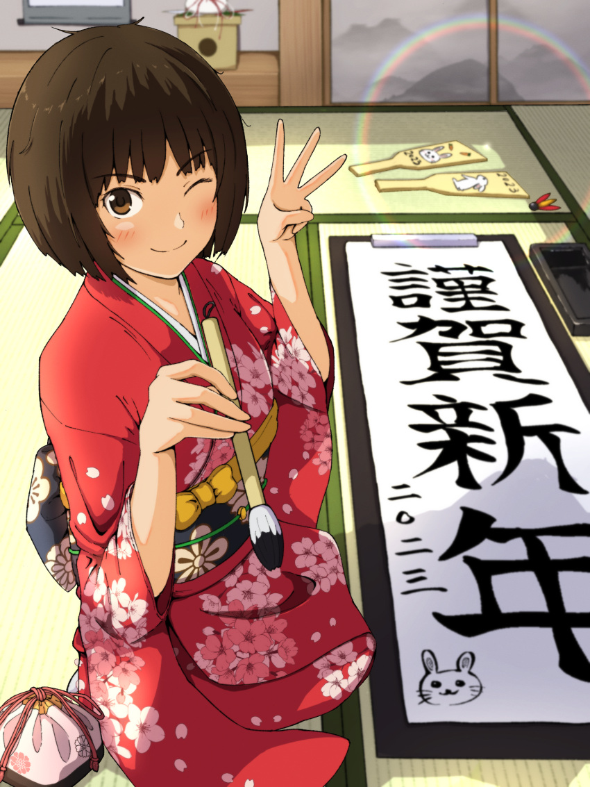 1girl ;) absurdres amagami architecture bangs black_sash blush bob_cut brown_eyes brown_hair chinese_zodiac clipboard closed_mouth commentary dated east_asian_architecture floral_print hanetsuki hanging_scroll happy_new_year highres holding holding_paintbrush ink japanese_clothes kagami_mochi kakizome kimono kinchaku long_sleeves looking_at_viewer messy_hair new_year obi one_eye_closed paddle paintbrush pouch rabbit rainbow ranmaru_(jackpot_1123) red_kimono sash scroll seiza short_hair shouji shuttlecock sitting sliding_doors smile solo tachibana_miya tatami tokonoma translated w year_of_the_rabbit