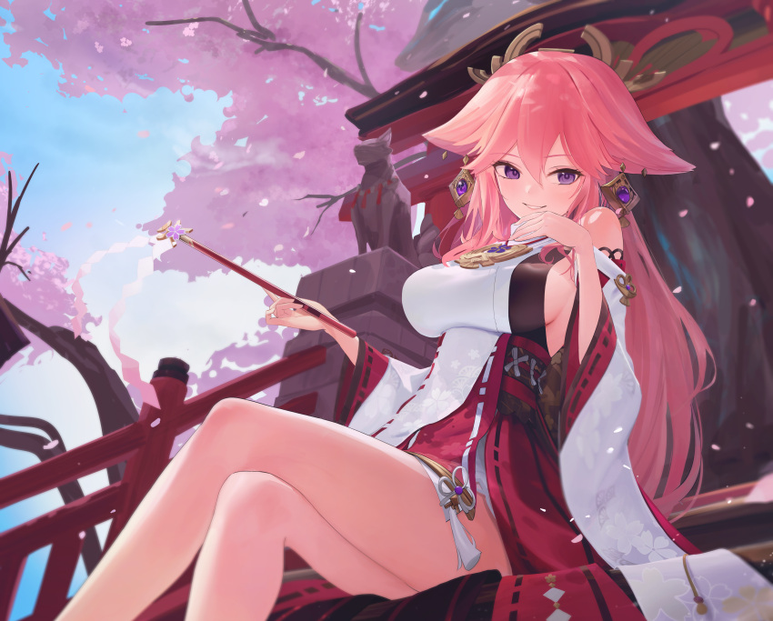 1girl absurdres animal_ears bare_legs bare_shoulders blue_sky blush breasts cherry_blossoms crossed_legs day detached_sleeves earrings falling_petals feet_out_of_frame floppy_ears flower_knot fox_ears genshin_impact gohei grin hair_between_eyes hair_ornament hand_up highres holding holding_gohei jewelry long_hair long_sleeves looking_at_viewer medium_breasts nontraditional_miko outdoors parted_lips petals pink_hair purple_eyes red_skirt ribbon_trim shirt sideboob sitting skirt sky sleeveless sleeveless_shirt smile solo takealook tassel thighs tree white_shirt white_sleeves wide_sleeves yae_miko