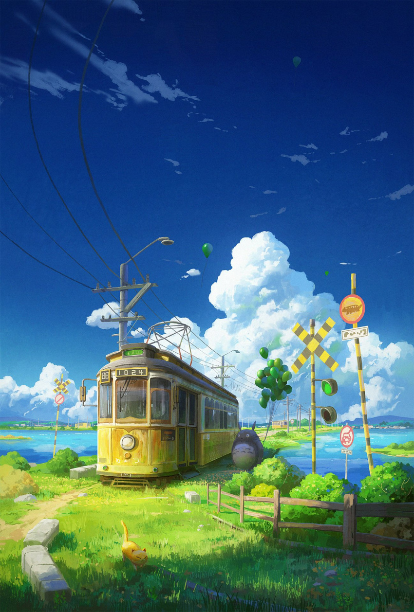 balloon blue_sky boom_barrier building bush cat cloud commentary cyclecircle day english_commentary fence grass highres holding holding_balloon mountainous_horizon nekobus no_humans no_motor_vehicles_sign outdoors path power_lines railroad_crossing road_sign rock scenery sign sky streetcar tonari_no_totoro totoro utility_pole water wooden_fence