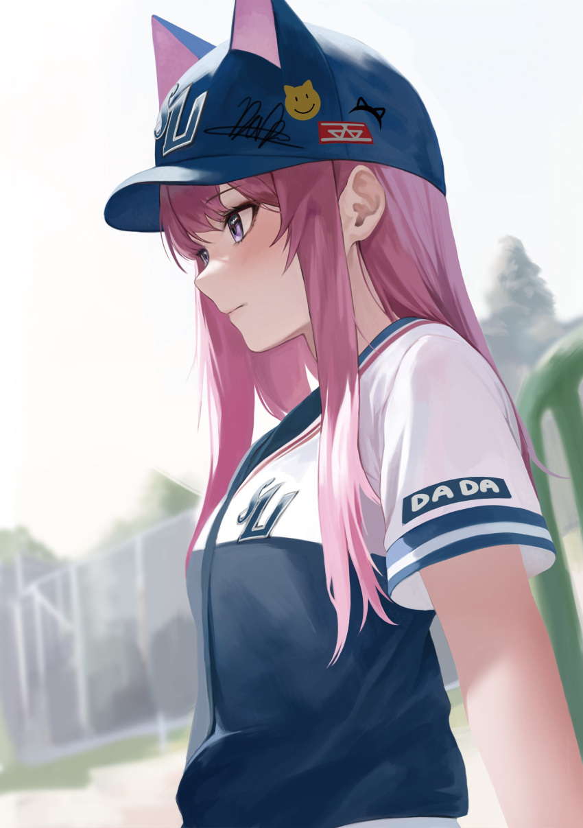 1girl absurdres animal_ears bangs baseball_cap baseball_uniform bburi blue_headwear blurry chain-link_fence closed_mouth commentary day depth_of_field fence from_side hat hat_with_ears highres long_hair original outdoors pink_hair purple_eyes short_sleeves solo sportswear symbol-only_commentary tree upper_body