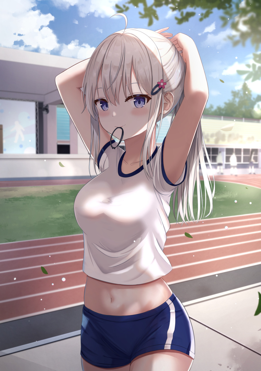 1girl ahoge arms_behind_head arms_up bare_arms blue_eyes blue_shorts breasts cowboy_shot crop_top day gym_uniform hair_ornament hair_tie_in_mouth hairclip highres long_hair looking_at_viewer medium_breasts midriff mouth_hold navel original outdoors ponytail shirt short_shorts short_sleeves shorts sidelocks smile solo standing stomach touhourh track_and_field white_hair white_shirt