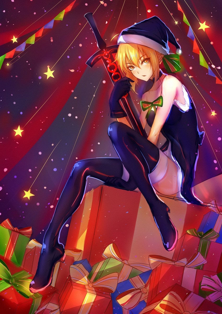 1girl artoria_pendragon_(fate) black_footwear black_thighhighs blonde_hair boots box english_commentary excalibur_morgan_(fate) fate/grand_order fate_(series) full_body fur_trim gift gift_box gloves hat highres looking_at_viewer santa_alter santa_costume santa_hat sitting solo star_(symbol) sword tenmoon thigh_boots thighhighs weapon yellow_eyes