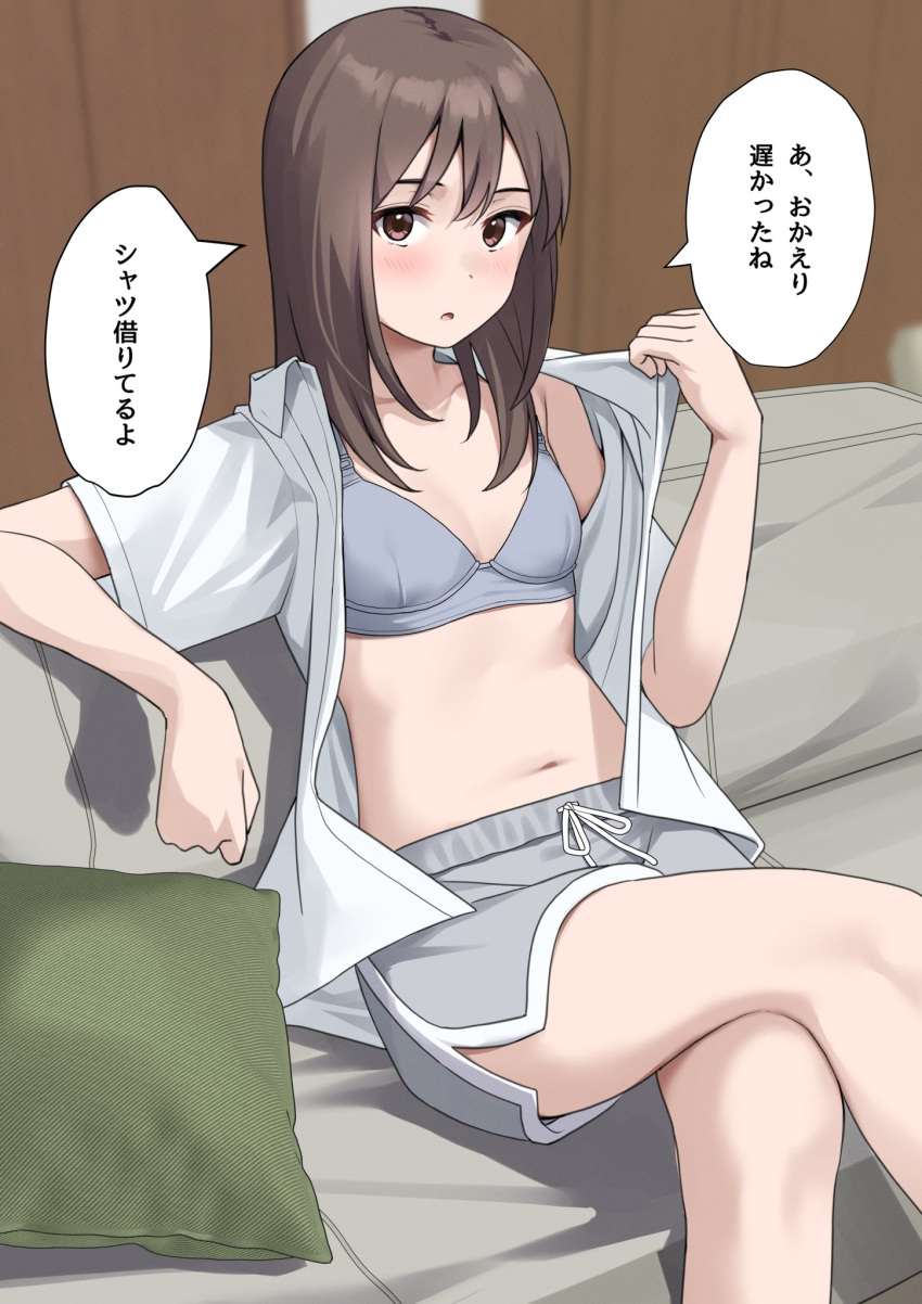 1girl bra brown_eyes brown_hair commentary crossed_legs dolphin_shorts highres indoors kiona_(giraffe_kiona) long_hair navel open_clothes open_shirt original shorts sitting solo translated underwear