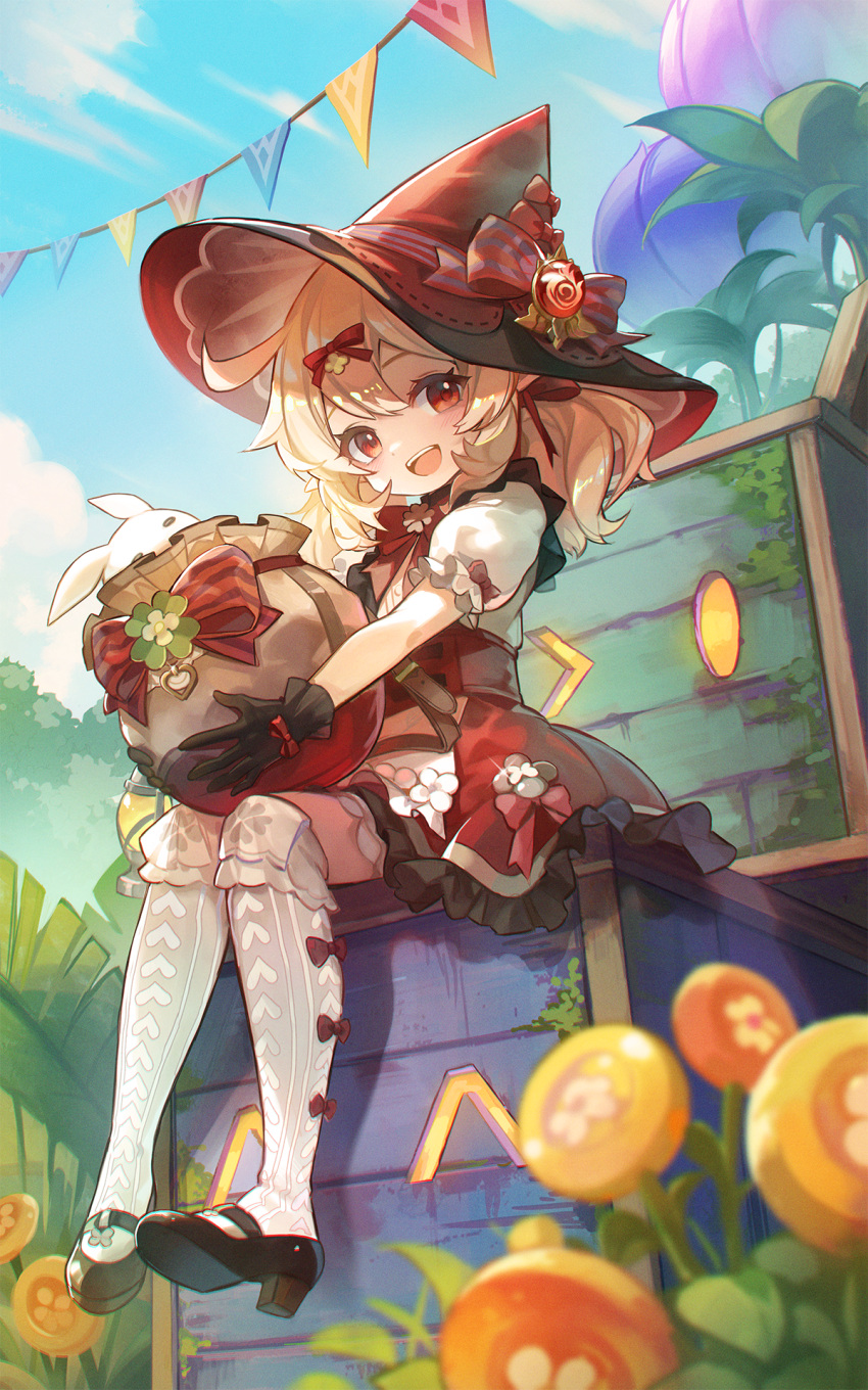 1girl :d black_footwear black_gloves blonde_hair blue_sky bow commentary_request flower full_body genshin_impact glove_bow gloves hat hat_bow highres holding klee_(blossoming_starlight)_(genshin_impact) klee_(genshin_impact) kyusoukyu long_hair looking_at_viewer mary_janes official_alternate_costume open_mouth outdoors puffy_short_sleeves puffy_sleeves red_bow red_eyes red_headwear red_skirt shirt shoes short_sleeves sitting skirt sky smile socks solo vision_(genshin_impact) white_shirt white_socks witch_hat