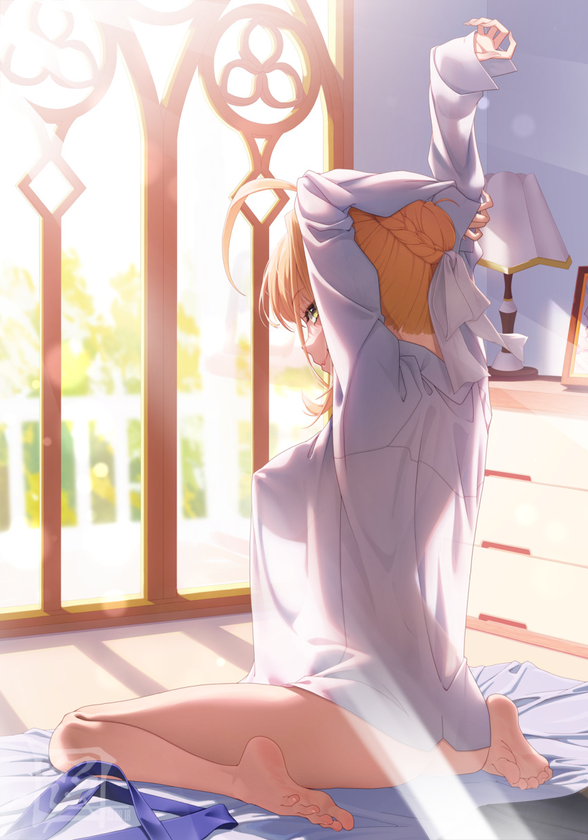 1girl ahoge arms_up ass bare_legs barefoot blonde_hair borrowed_clothes bottomless breasts collared_shirt covered_nipples fate/grand_order fate_(series) from_behind green_eyes hair_intakes highres indoors large_breasts long_sleeves looking_at_viewer looking_back morning nape nero_claudius_(fate) on_bed see-through see-through_silhouette shirt shirt_overhang sideboob sitting smile soles solo stretching sunlight suryua toes waking_up wariza white_shirt window