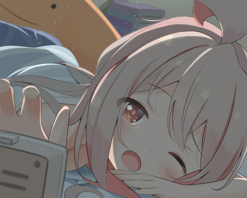 1girl ;o absurdres ahoge alarm_clock blush book book_stack brown_eyes c: clock commentary eyes_visible_through_hair foreshortening grey_hair highres indoors light_particles looking_at_viewer lying miyatanpo615 multicolored_hair on_stomach one_eye_closed onii-chan_wa_oshimai! oyama_mahiro pink_hair smile solo tears two-tone_hair waking_up wince