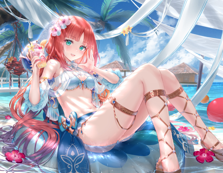 1girl bare_shoulders bikini blue_bikini blue_skirt blue_sky blush breasts cleavage cup flower genshin_impact green_eyes hair_flower hair_ornament highres kachayori large_breasts long_hair looking_at_viewer low_twintails navel nilou_(genshin_impact) open_mouth palm_tree red_hair sandals sash sidelocks skirt sky smile solo swimsuit thighlet thighs tree twintails water