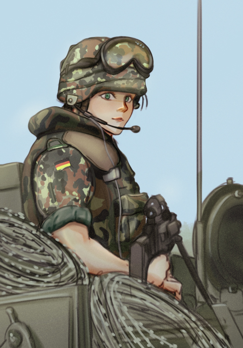 1girl assault_rifle barbed_wire body_armor brown_hair bundeswehr camouflage combat_helmet flecktarn german_army german_flag goggles goggles_on_headwear green_eyes gun hatch headset helmet highres holding holding_gun holding_weapon mg_g microphone military military_uniform military_vehicle motor_vehicle optical_sight original outdoors rifle tank uniform weapon