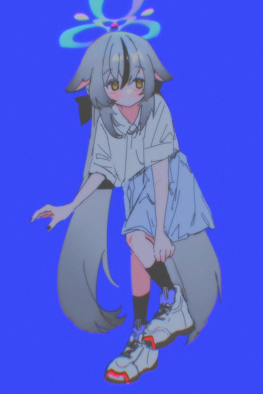 1girl absurdres adjusting_clothes adjusting_legwear alternate_costume black_hair black_socks blue_archive blue_background blue_skirt crossed_bangs full_body grey_hair highres kokona_(blue_archive) low_twintails multicolored_hair orange_eyes pong2 shirt shoes sidelocks simple_background skirt sneakers socks solo streaked_hair twintails white_footwear white_shirt