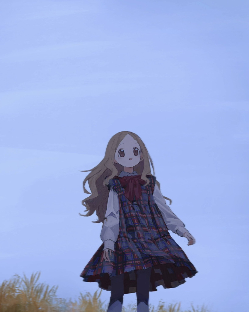 1girl aoba_kokona black_pantyhose blue_dress blue_sky bow bowtie brown_hair collared_shirt day dress feet_out_of_frame grass hansei_(oisiikonnyaku) highres long_hair long_sleeves open_mouth outdoors pantyhose parted_bangs plaid plaid_dress purple_eyes red_bow red_bowtie shirt sky sleeveless sleeveless_dress smile solo standing wavy_hair white_shirt yama_no_susume