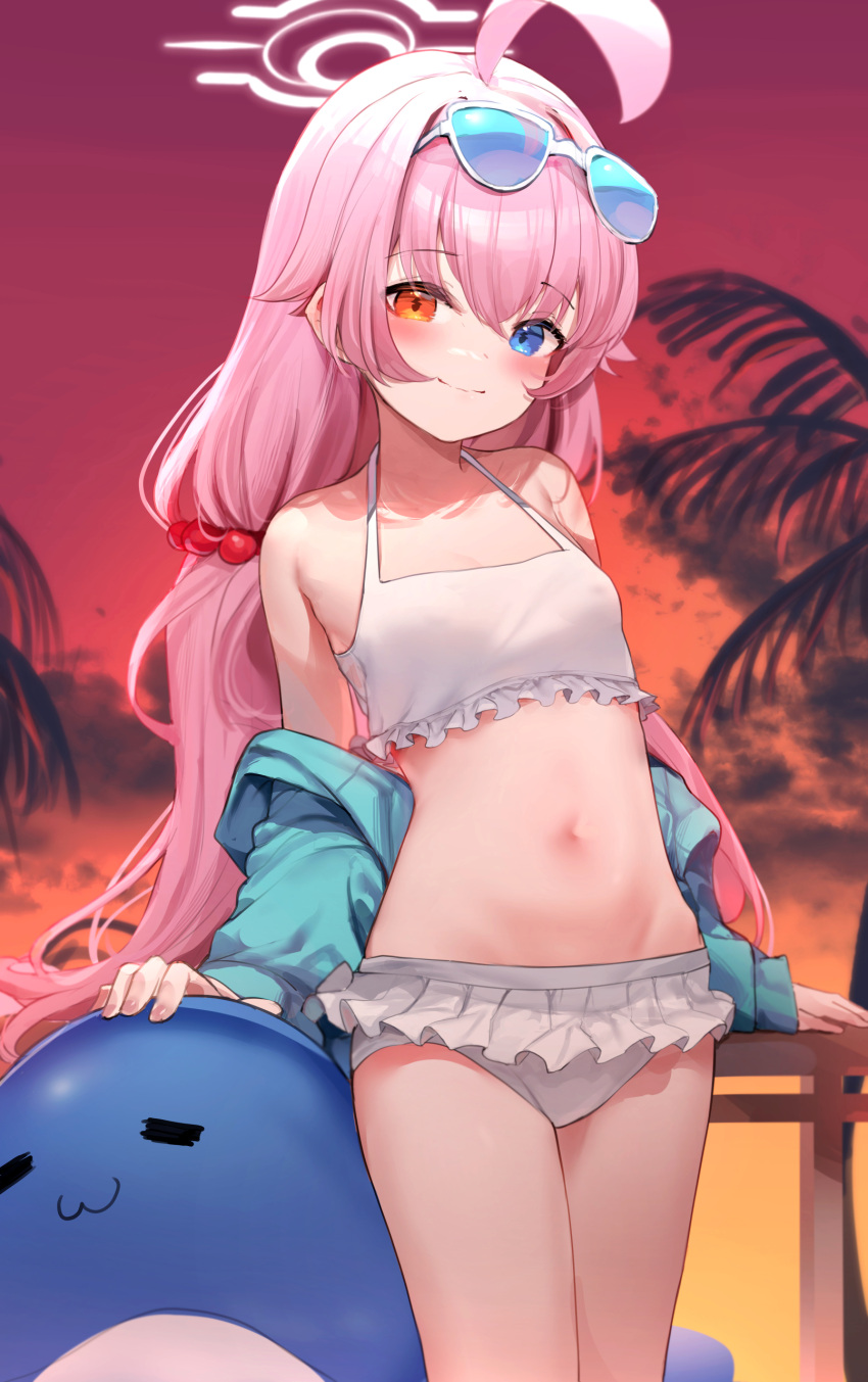 1girl absurdres against_railing arm_behind_back bare_shoulders beach bikini bikini_skirt blue_archive blue_eyes blue_jacket blush breasts evening eyewear_on_head frilled_bikini frills hair_between_eyes hair_bobbles hair_ornament halo heterochromia highres hoshino_(blue_archive) hoshino_(swimsuit)_(blue_archive) inflatable_toy inflatable_whale jacket jacket_pull long_hair looking_at_viewer midriff navel off_shoulder orange_eyes outdoors palm_tree pink_hair railing small_breasts smile solo somray sunglasses sunset swimsuit tree very_long_hair white_bikini yellow_eyes