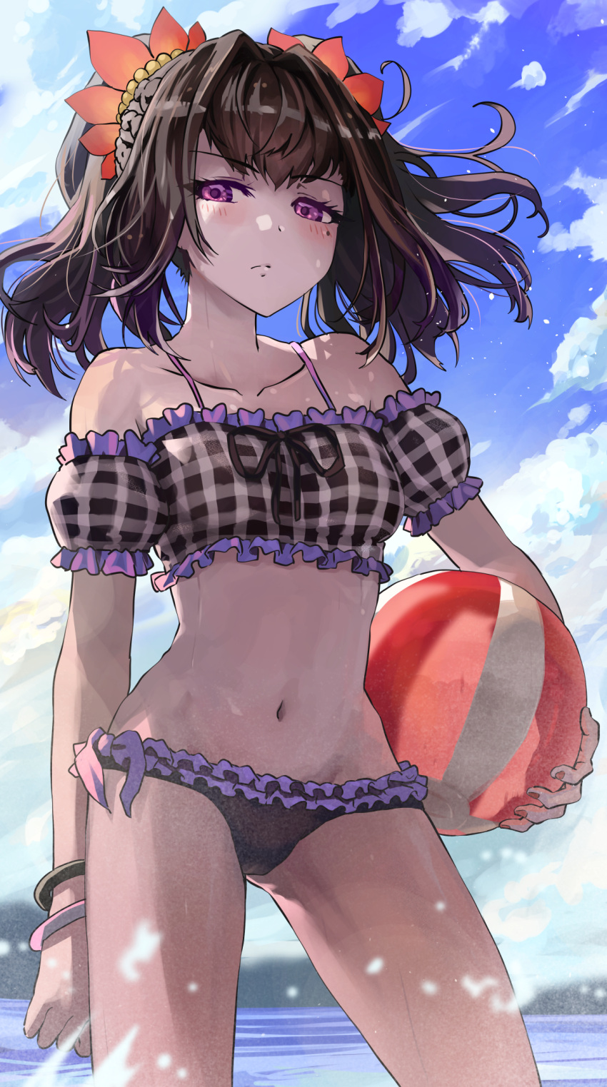 1girl ball beachball bikini blush bow bowtie brown_hair closed_mouth cloud cloudy_sky collarbone day frilled_bikini frills groin hair_ornament highres holding holding_ball looking_at_viewer looking_down melaton mole mole_under_eye nail_polish navel outdoors purple_eyes sky swimsuit symonne_(tales) tales_of_(series) tales_of_zestiria water wristband