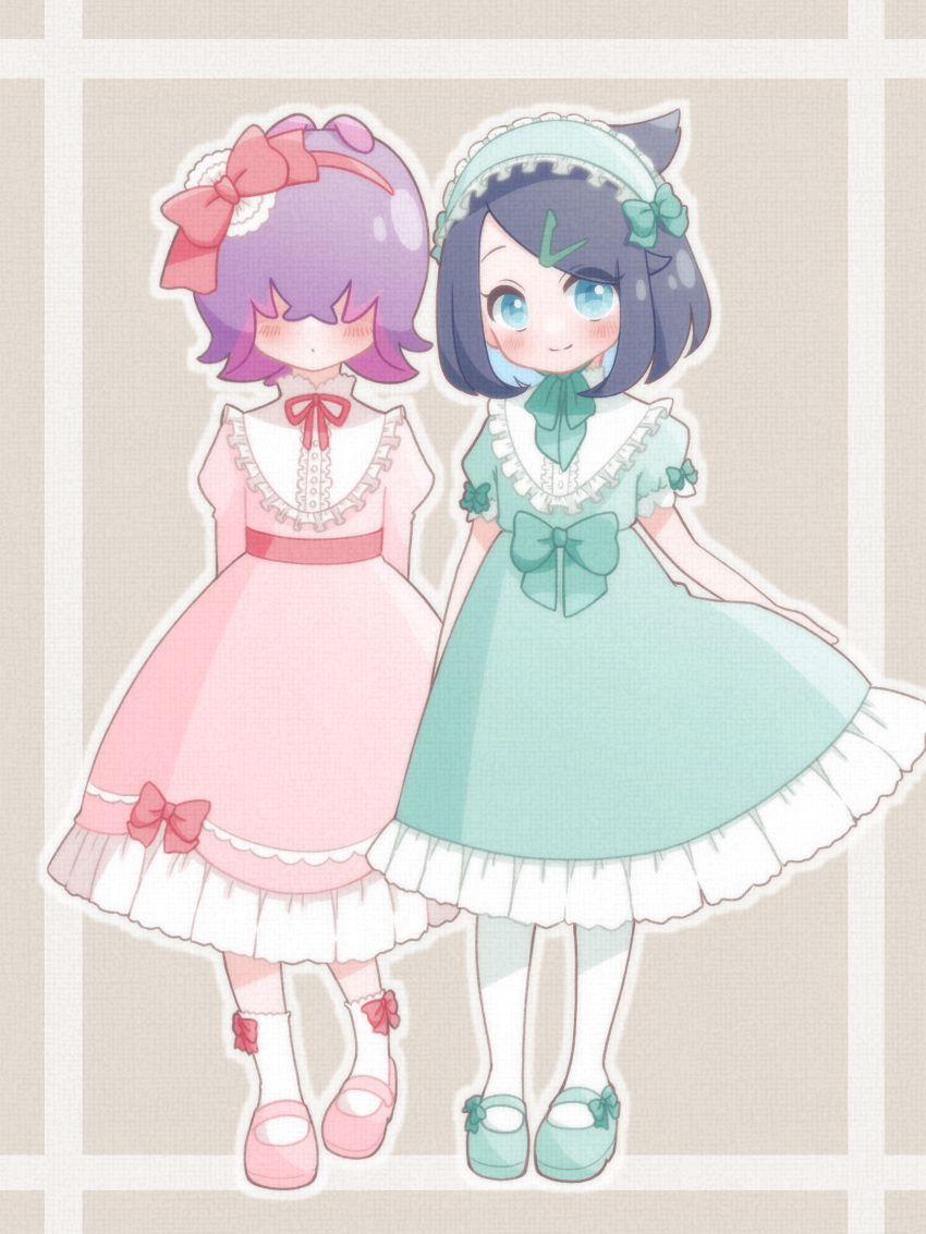 2girls absurdres alternate_costume ascot blush bow buttons closed_mouth commentary_request dot_(pokemon) dress eyelashes green_ascot green_dress green_eyes green_footwear hair_over_eyes hairband highres liko_(pokemon) lolita_fashion multiple_girls neck_ribbon petako_(ptpt_k) pink_dress pink_footwear pokemon pokemon_(anime) pokemon_horizons purple_hair red_ribbon ribbon shirt shoes smile socks standing white_shirt white_socks