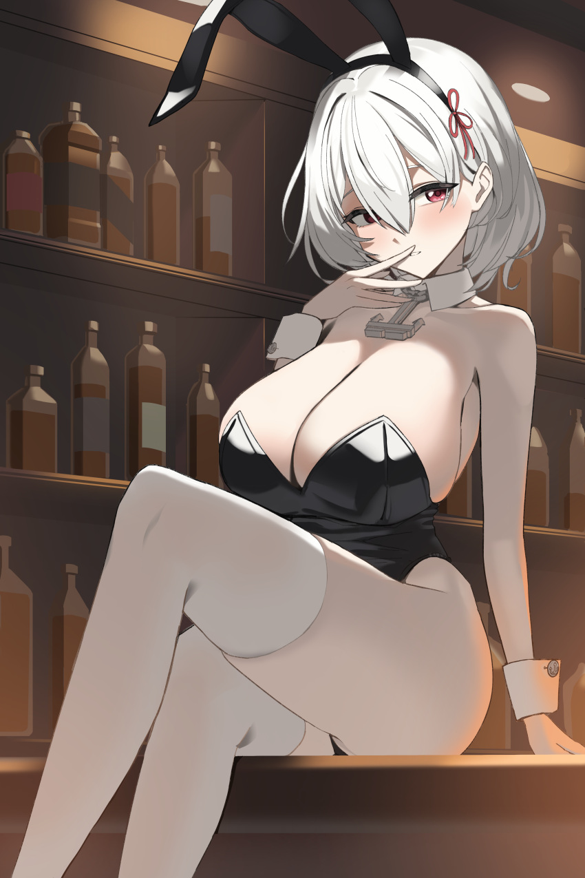 1girl absurdres anchor_ornament animal_ears azur_lane bare_shoulders binu_(nadenade) black_hairband black_leotard breasts cleavage detached_collar fake_animal_ears hair_between_eyes hairband hand_up highres indoors large_breasts leotard looking_at_viewer parted_lips playboy_bunny red_eyes short_hair sirius_(azur_lane) sitting solo strapless strapless_leotard thighhighs white_hair white_thighhighs wrist_cuffs