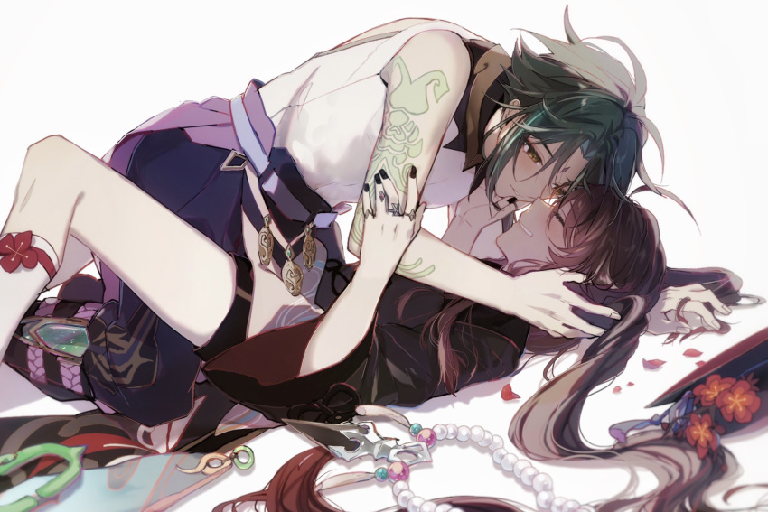 1boy 1girl arm_tattoo blush brown_hair commentary_request genshin_impact green_hair hand_on_another's_face hat hat_removed headwear_removed highres hu_tao_(genshin_impact) hug jewelry long_hair lying necklace on_back on_ground smile tattoo tk_n_gm xiao_(genshin_impact) yellow_eyes