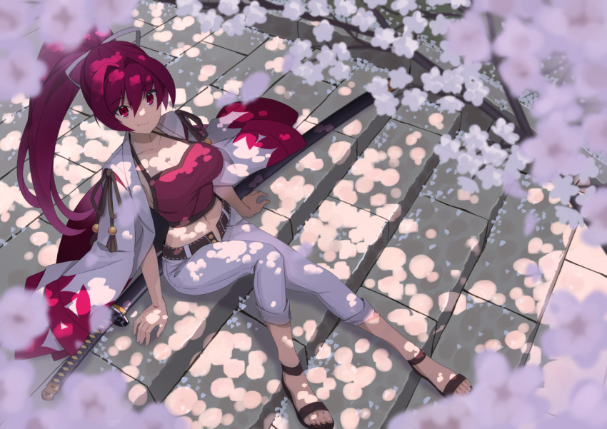 1girl breasts cherry_blossoms cleavage crop_top hair_ribbon inugoya jacket koya_keisuke large_breasts long_hair looking_at_viewer midriff navel outdoors pants petals ponytail purple_hair red_eyes ribbon sandals smile solo sword under_night_in-birth very_long_hair weapon yuzuriha_(under_night_in-birth)