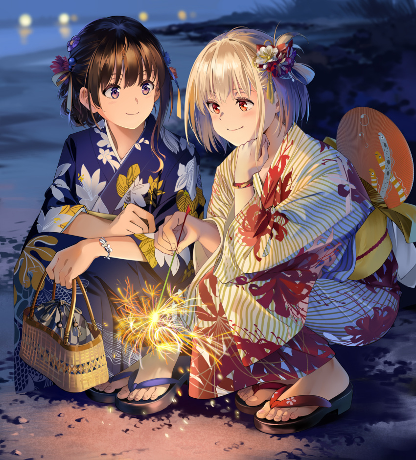 2girls beach black_hair blonde_hair blue_kimono commentary feet fireworks floral_print floral_print_kimono flower hair_flower hair_ornament highres inoue_takina japanese_clothes kimono long_sleeves lycoris_recoil multiple_girls neko_(yanshoujie) night night_sky nishikigi_chisato obi purple_eyes red_eyes sandals sash short_hair sky smile sparkler spider_lily_print squatting symbol-only_commentary toes