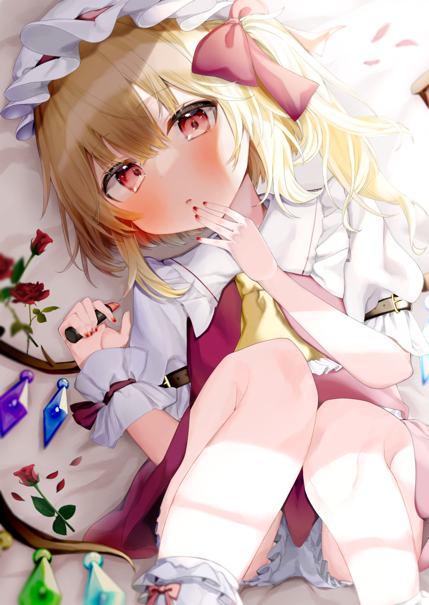 1girl absurdres ascot blonde_hair bloomers blush cosmetics crystal expressionless feet_out_of_frame flandre_scarlet flower frilled_shirt_collar frills hand_to_own_mouth hat highres holding holding_lipstick_tube lipstick_tube looking_at_viewer lying mob_cap nail_polish nano_(nazuna0512) on_back on_bed one_side_up panties pantyshot parted_lips petals puffy_short_sleeves puffy_sleeves red_eyes red_flower red_nails red_rose rose short_hair_with_long_locks short_sleeves solo touhou underwear wings wrist_cuffs yellow_ascot