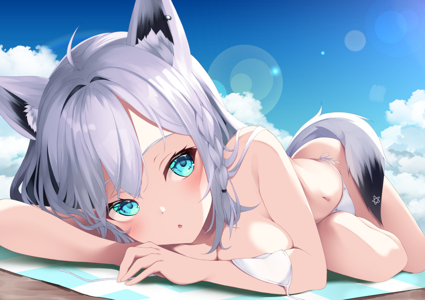 1girl ahoge animal_ears beach_towel bikini blue_eyes blue_sky blush breasts cleavage cloud fox_ears fox_girl fox_tail grey_hair head_rest highres hololive koko_sokodoko long_hair looking_at_viewer lying medium_breasts on_side open_mouth shirakami_fubuki side-tie_bikini_bottom sky solo swimsuit tail towel virtual_youtuber white_bikini