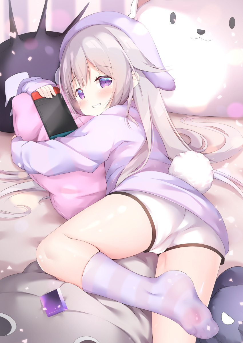 1girl absurdres animal_ears ass blush brown_hair cameltoe fake_animal_ears fake_tail grin highres holding hololive hololive_english jacket koseki_bijou long_hair lying nintendo_switch no_shoes on_side pillow purple_eyes rabbit_ears rabbit_tail renew_vivi short_shorts shorts smile socks soles solo striped striped_jacket striped_socks tail very_long_hair virtual_youtuber white_shorts