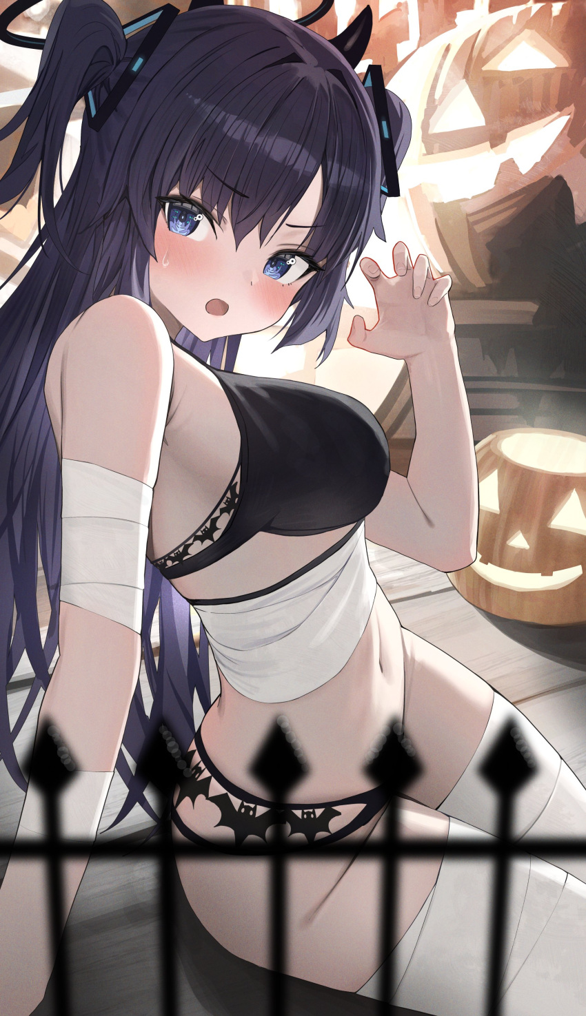 1girl absurdres bandaged_arm bandaged_hand bandaged_head bandaged_leg bandaged_neck bandages bare_shoulders black_panties blue_archive blue_eyes blurry blurry_foreground blush breasts claw_pose demon_horns depth_of_field halloween halloween_bucket halloween_costume happy_halloween hidulume highres horns jack-o'-lantern large_breasts long_hair looking_at_viewer mummy mummy_costume naked_bandage navel open_mouth panties pumpkin purple_hair sarashi solo thighhighs thighs trick_or_treat underwear volleyball