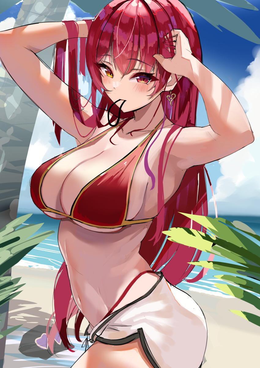 1girl absurdres armpits arms_up beach bikini bikini_under_clothes blush breasts earrings hair_tie hair_tie_in_mouth hands_up heart heterochromia highres hololive houshou_marine jewelry large_breasts leaf long_hair looking_at_viewer mouth_hold navel palm_tree puripuri red_bikini red_eyes red_hair shorts solo string_bikini swimsuit tree water white_shorts yellow_eyes