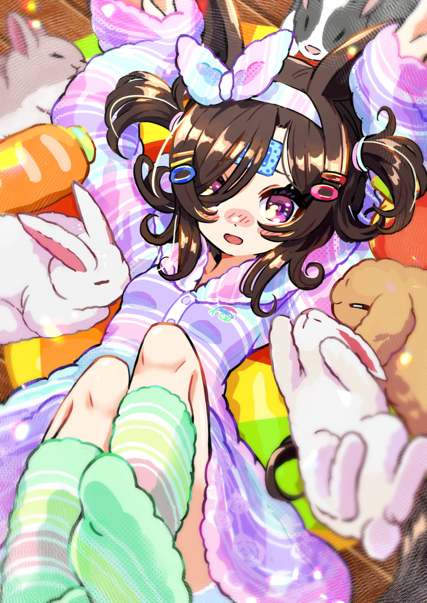 1girl alternate_costume alternate_hairstyle animal_ears arms_up black_hair blurry blurry_foreground blush breasts hair_ornament hair_over_one_eye headband highres horse_ears kingin looking_at_viewer lying open_mouth pajamas purple_eyes rabbit rabbit_pose rice_shower_(umamusume) small_breasts socks solo umamusume