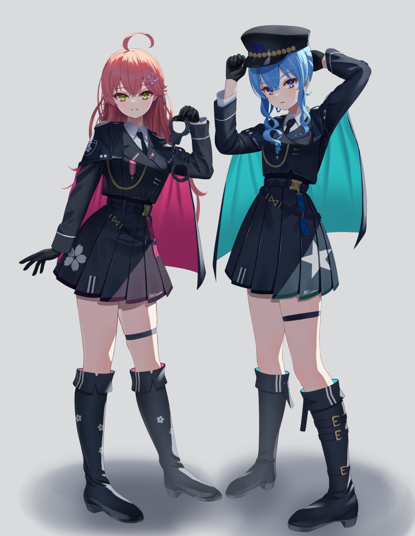 2girls absurdres adjusting_clothes adjusting_headwear ahoge aiguillette asakura_(asa_t77) black_footwear black_gloves black_headwear black_jacket black_necktie black_skirt blue_eyes blue_hair boots capelet closed_mouth collared_shirt commentary_request crossed_bangs cuffs floral_print flower_brooch gloves green_eyes grey_background hair_between_eyes handcuffs hat highres holding holding_handcuffs hololive hoshimachi_suisei jacket knee_boots light_blush long_hair long_sleeves looking_at_viewer multiple_girls necktie peaked_cap pink_hair pleated_skirt police police_uniform policewoman sakura_miko shadow shirt short_hair sidelocks simple_background skirt smile standing star_(symbol) thigh_strap uniform virtual_youtuber white_shirt