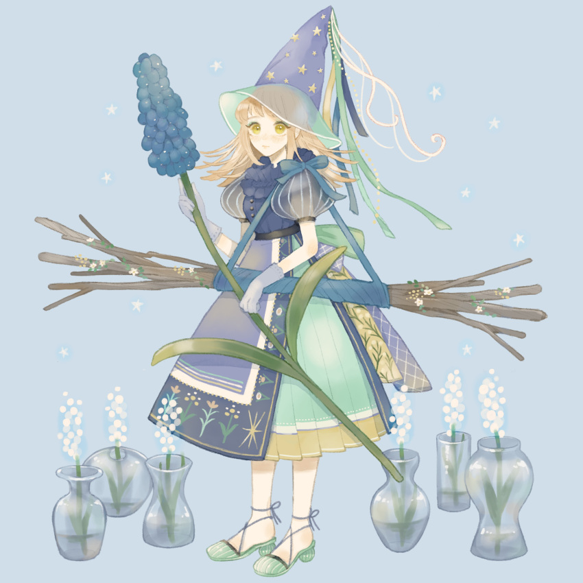 1girl ankle_strap blonde_hair blue_background blush dress flower full_body gloves green_eyes hat hat_ribbon highres holding holding_flower layered_dress looking_at_viewer original oversized_flower pleated_dress puffy_short_sleeves puffy_sleeves ribbon see-through see-through_sleeves short_sleeves solo star_(symbol) stick vase witch witch_hat yunoto_(conceit)