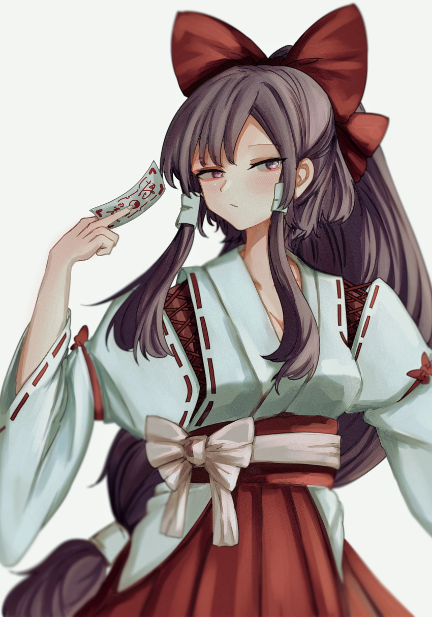 1girl :/ absurdres between_fingers blush bow breasts brown_hair cleavage closed_mouth commentary_request expressionless hair_bow hair_tubes hakama hakurei_reimu hand_up high_ponytail highres holding japanese_clothes long_hair looking_at_viewer low-tied_long_hair medium_breasts mesuosushi red_bow red_hakama sidelocks simple_background sleeves_past_elbows solo touhou very_long_hair white_background wide_sleeves